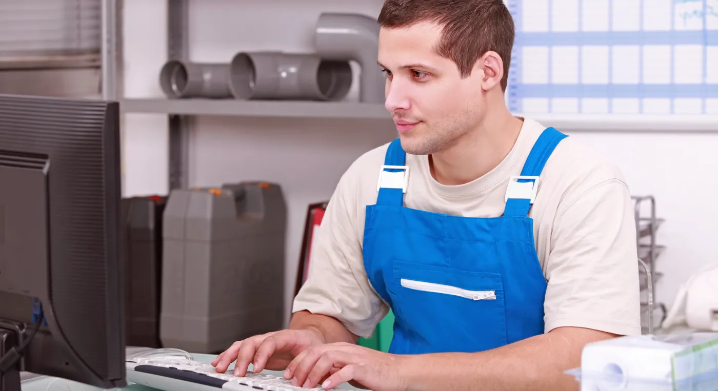 Commercial contractor reviewing a job queue